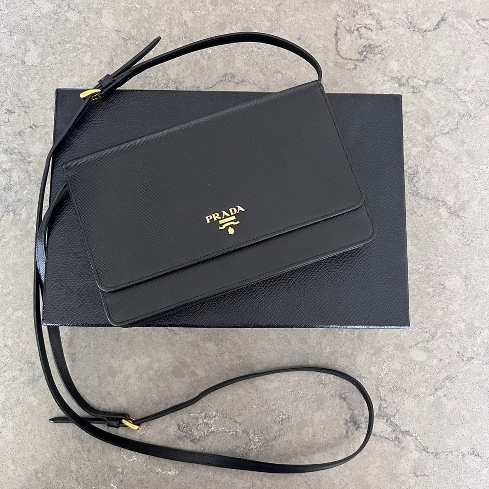 Prada clutch.